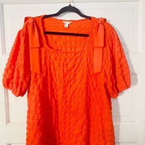 Cato Vibrant Orange Textured Blouse with Bow Accents